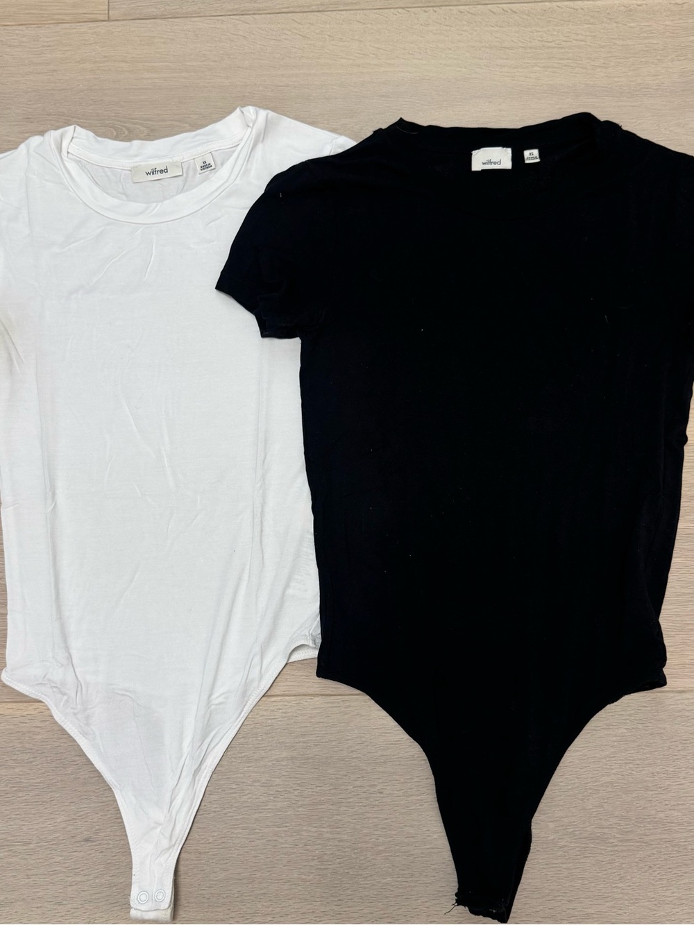 Pair of Wilfred Thong Bodysuits  (black and white) -XS